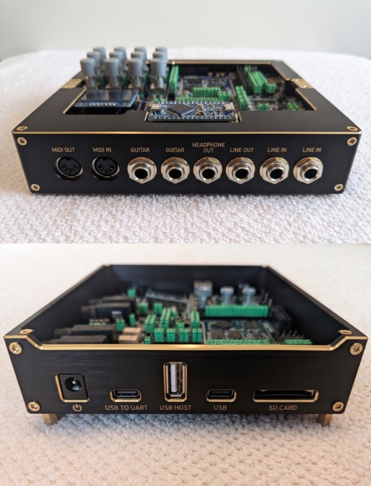 A generated concept image of a possible HRN SXTN enclosure, shown from both ends: a black anodised case with gold trim. One end carries MIDI OUT, MIDI IN, two GUITAR jacks, HEADPHONE OUT, LINE OUT and two LINE IN. The other carries a power inlet, USB TO UART, a type-A USB HOST port, a USB-C port and an SD card slot. It is not a photograph of the measured hardware.